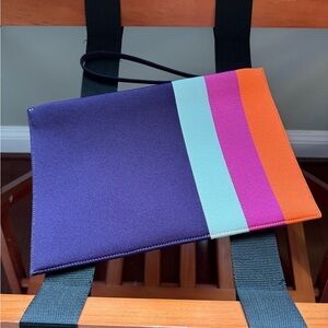 Rothy’s Sugar Plum Essential Pouch with magnets